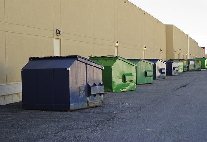 a large metal bin for waste disposal on the construction site in Albert City, IA